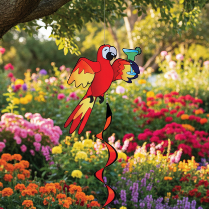 Colorful parrot-shaped kite hanging from a tree in a garden with flowers and trees.