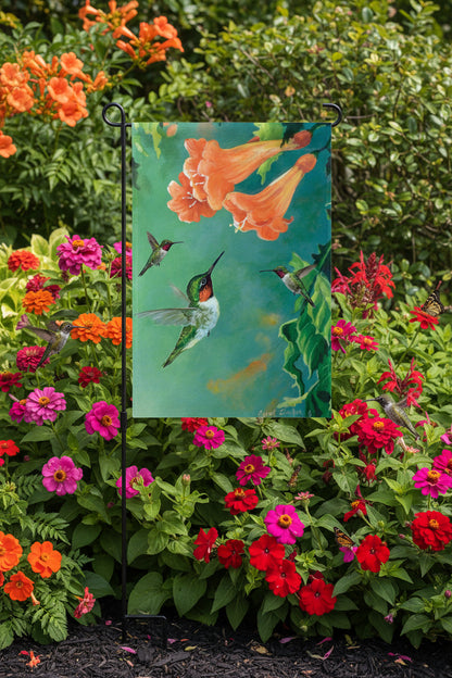 Decorative garden flag with a hummingbird and flowers on a green background
